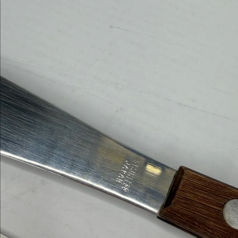 Source Unknown sleek spatula